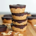 no bake peanut butter oat cups on wooden board